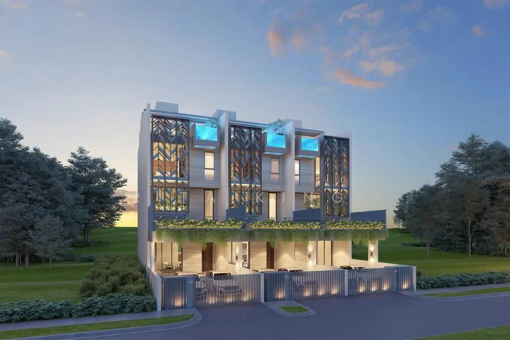Brand new three-storey inter-terrace house in District 15, East Coast, Singapore, viewed from the street at dusk